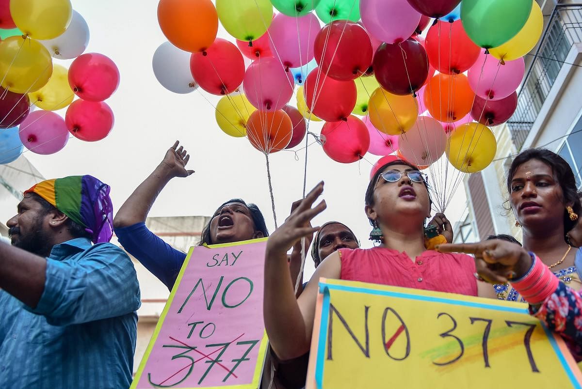 Chennai: LGBT community members participate in 'National Coming Out Day' to mark the anniversary of High Court's verdict amending Section 377, in Chennai on Monday, July 02, 2018. (PTI Photo/R Senthil Kumar)
