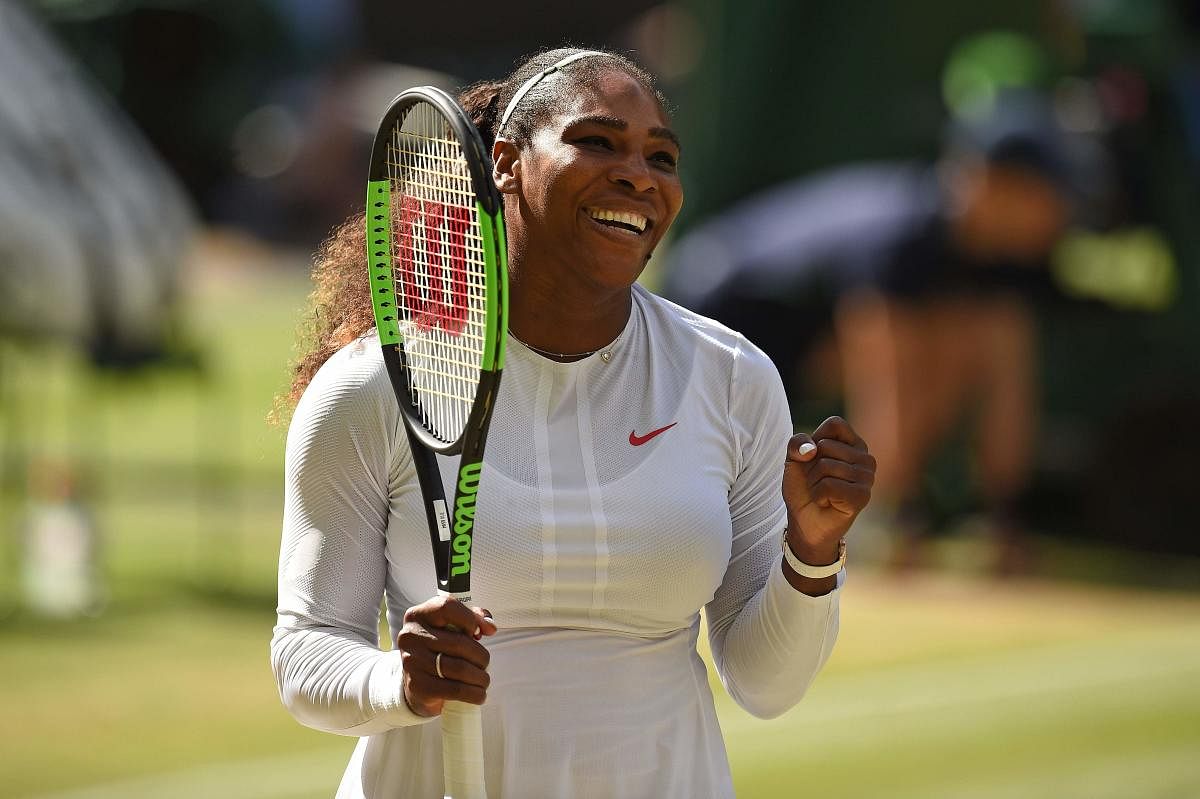 Serena Williams of the US celebrates after winning against Italy's Camila Giorgi. (AFP Photo)