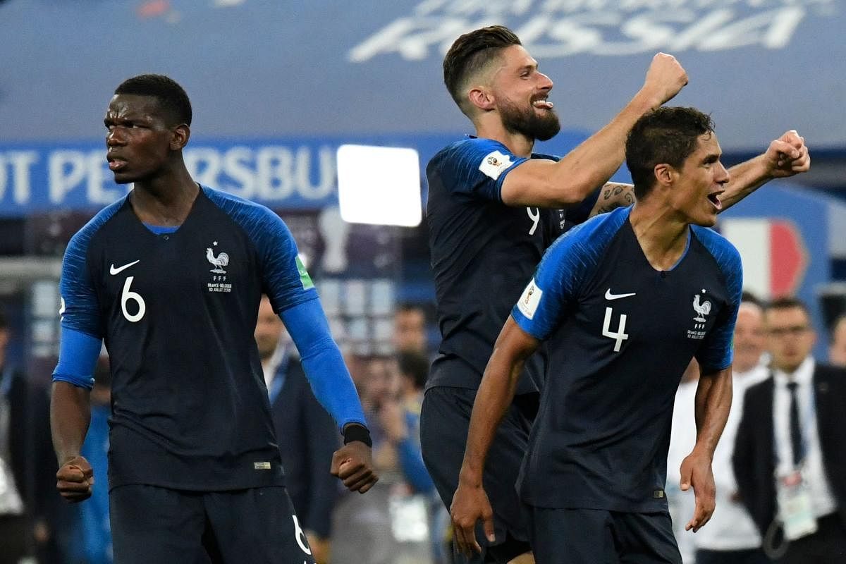 HERE WE COME! (From left) France's Paul Pogba, Olivier Giroud and Raphael Varane celebrate their semifinal win over Belgium on Tuesday. (AFP Photo)
