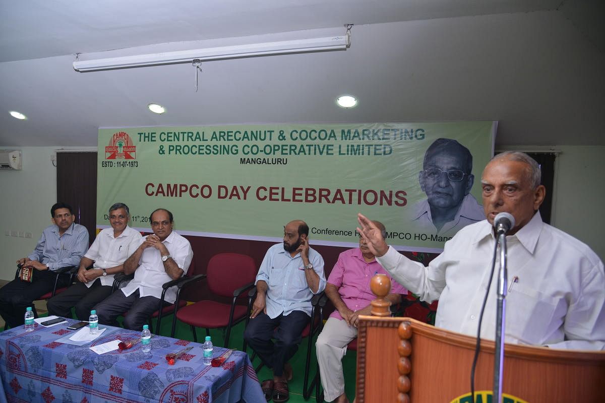 Campco founder director L T Thimmappa Hegde speaks at Campco Day celebrations in Mangaluru on Wednesday.