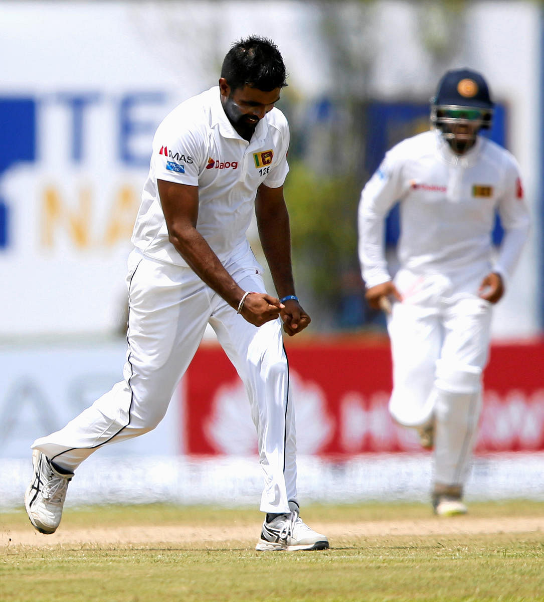 Wrecker-in-chief: Sri Lanka's Dilruwan Perera celebrates after dismissing South Africa's Quinton de Kock on Friday. REUTERS