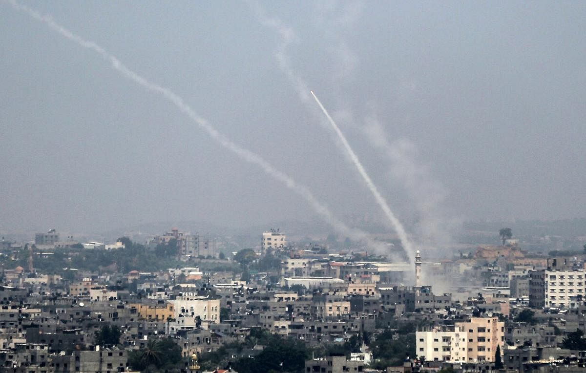 Palestinian rockets being fired from Gaza City towards Israel on Saturday. AFP