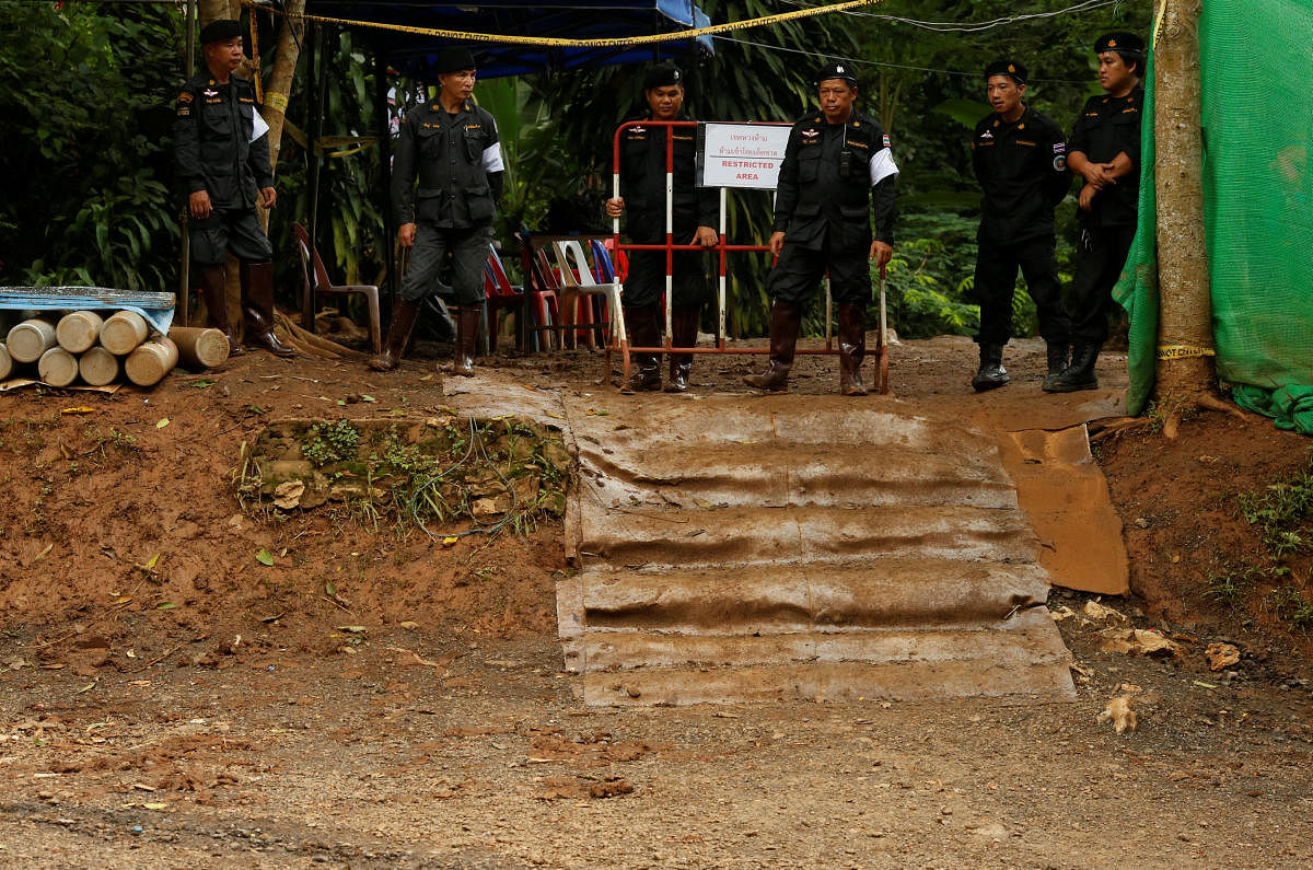 Police stand guard outside the Tham Luang cave complex, after the rescue mission for the 12 boys of the "Wild Boars" soccer team and their coach, in the northern province of Chiang Rai. Reuters photo.