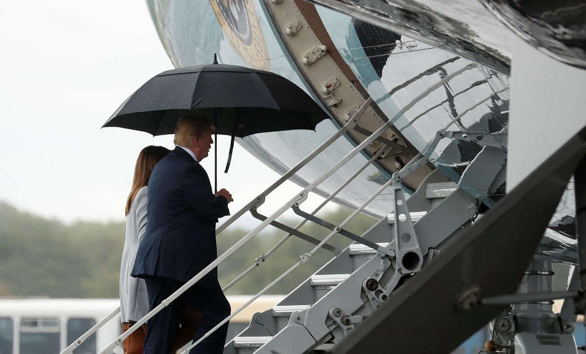 U.S. President Donald Trump and first lady Melania Trump depart from Glasgow for Helsinki. Reuters
