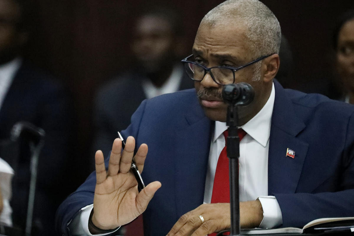 Haitian Prime minister Jack Guy Lafontant. gestures during a meeting with members of the Parliament in Port-au-Prince, Haiti, July 14, 2018. REUTERS.