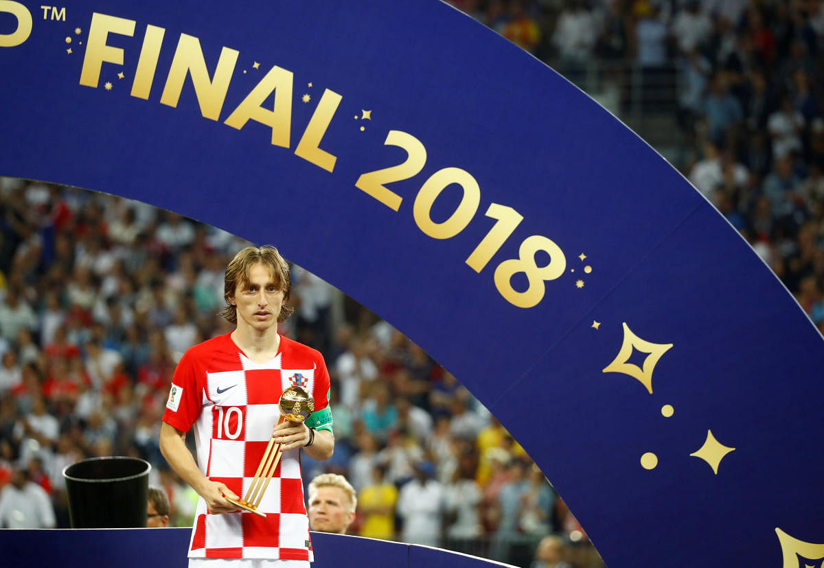 Croatia's Luka Modric poses with the FIFA Golden Ball award. REUTERS photo.