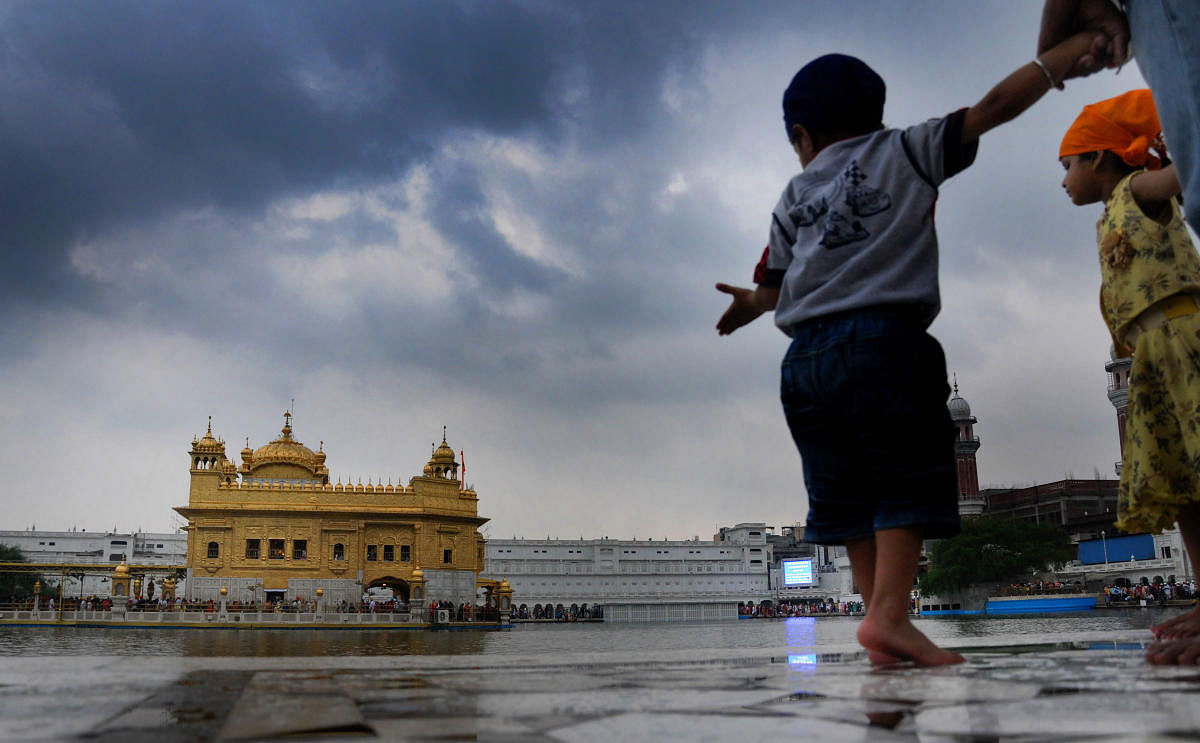 Amritsar: A view of Sri Harmandir Sahib (Golden Temple) on a cloudy day in Amritsar, on Friday, June 29, 2018. (PTI Photo)