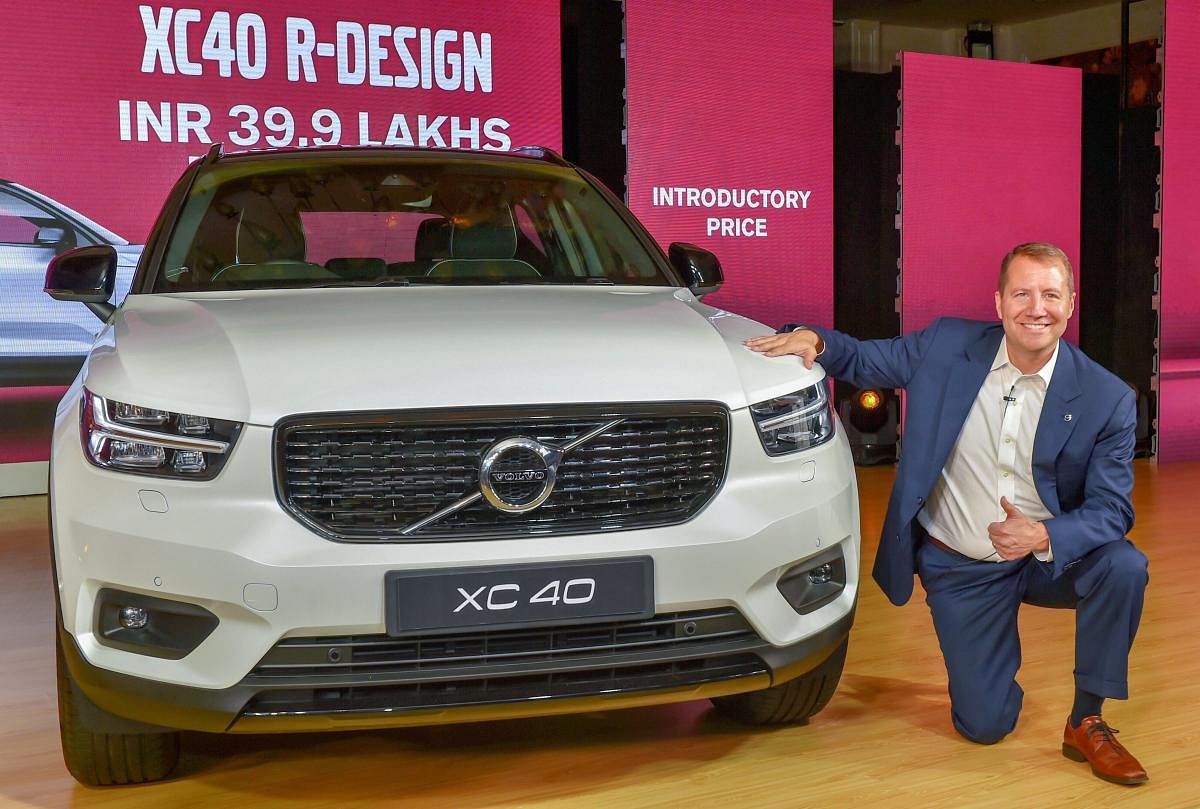 New Delhi: Volvo Car India Managing Director Charles Frump pose with the new SUV XC40 during its launch, in New Delhi on Wednesday, July 04, 2018. (PTI Photo/Kamal Kishore)(PTI7_4_2018_000093B)