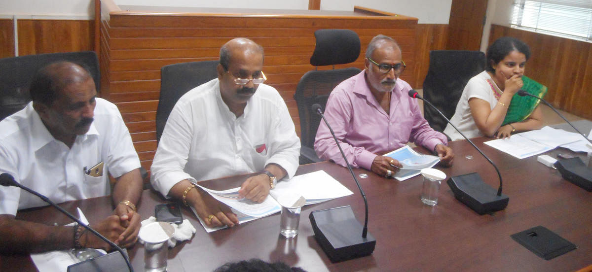 Minister for Fisheries and Animal Husbandry Venkata Rao Nadagouda chairs a meeting in Udupi on Wednesday.