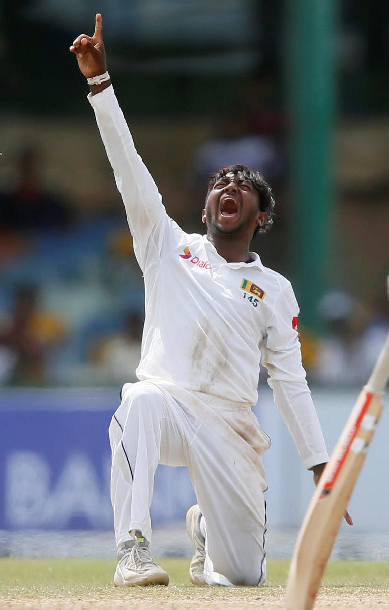 Sri Lanka's Akila Dananjaya celebrates the dismissal of South Africa's Dale Steyn on Saturday. REUTERS