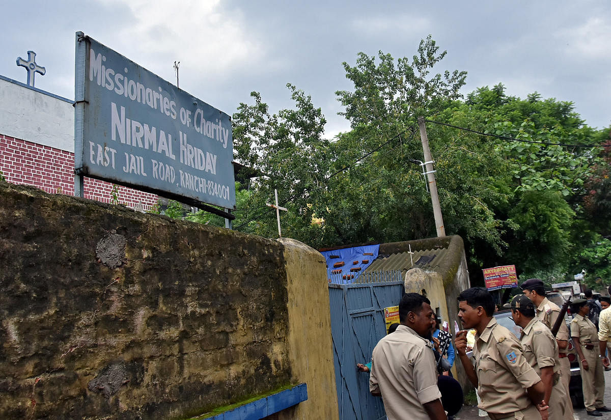 Police stand outside a home which provides shelter for pregnant unmarried women run by the Missionaries of Charity, a Roman Catholic order founded by Mother Teresa, in Ranchi. Reuters file photo.