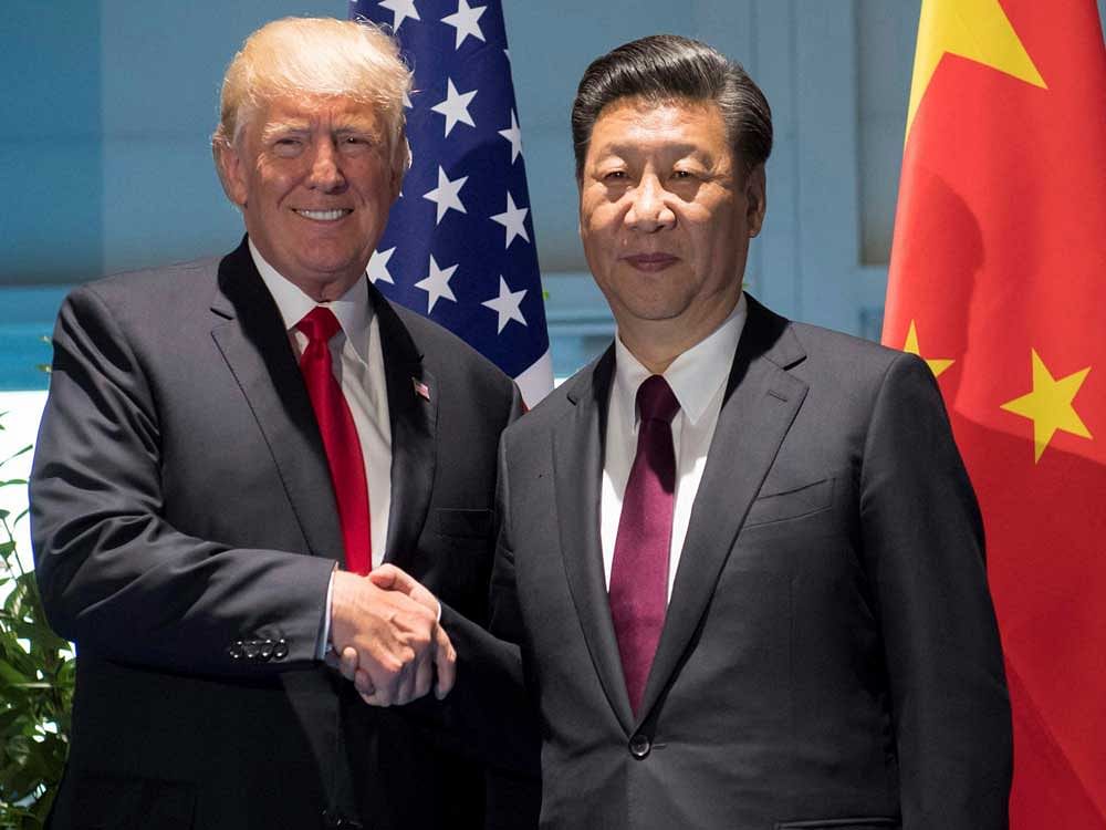 China President Xi Jingping and US President Donald Trump. AP PTI photo. 