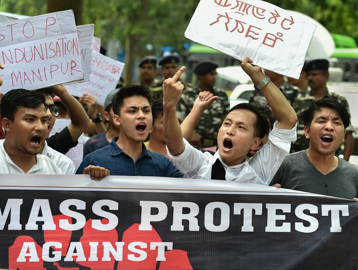 New Delhi: Manipur University Student's Union (MUSU) raise slogans demanding the removal of Vice Chancellor Adya Prasad Pandey, in New Delhi on Wednesday, July 18, 2018. (PTI Photo/Arun Sharma)