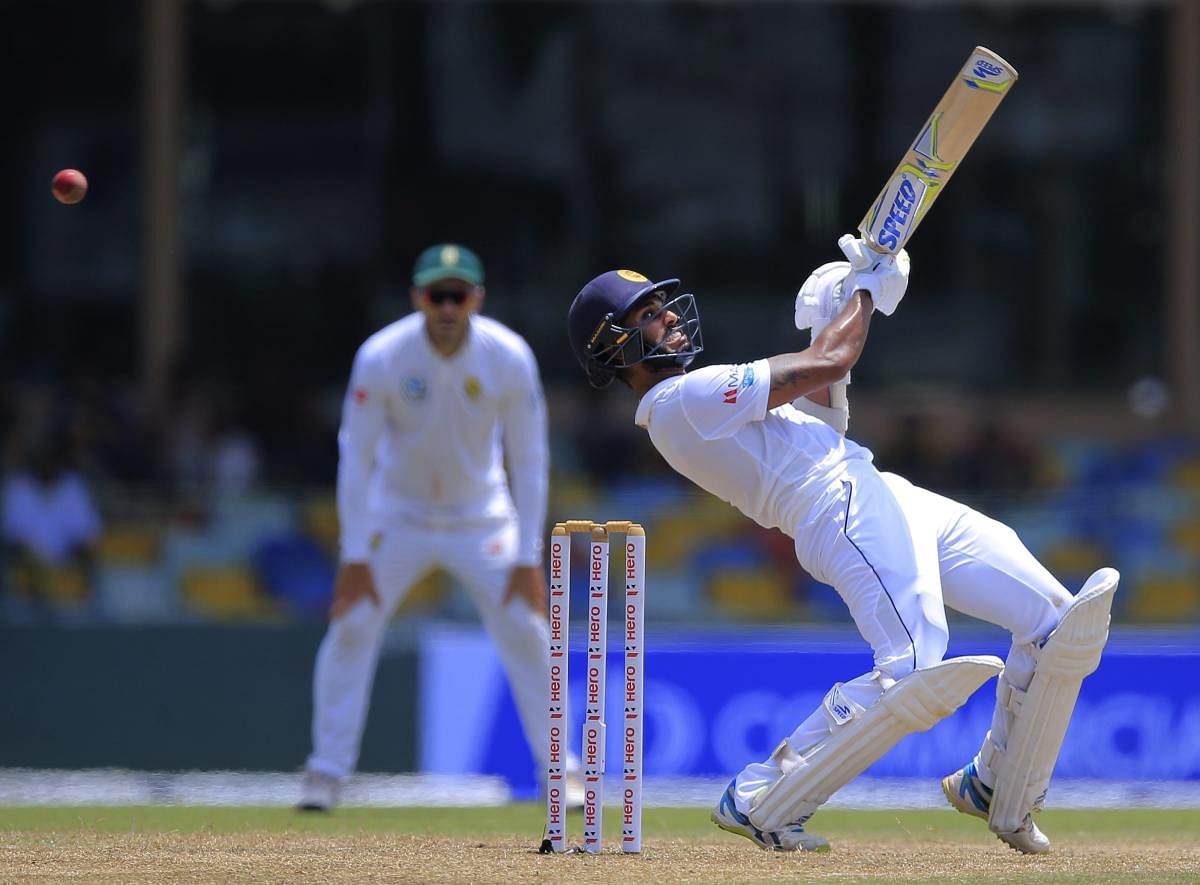 Sri Lanka's Roshen Silva bends to avoid a rising delivery bowled by South Africa's Dale Steyn during the third day play of their second test cricket match in Colombo. AP/PTI
