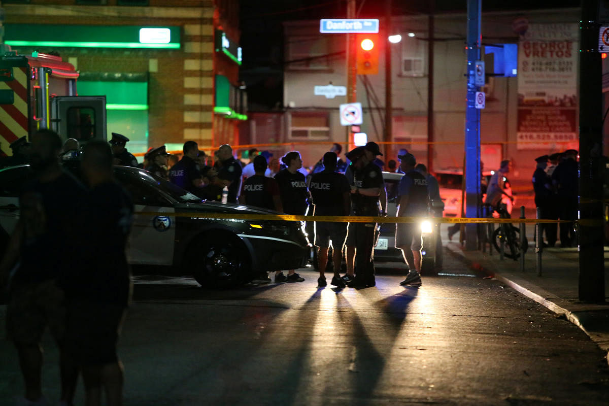 Police are seen near the scene of a mass shooting in Toronto, Canada, July 22, 2018. REUTERS photo.