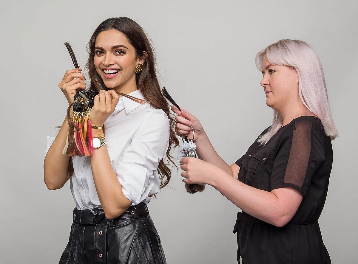 Bollywood actor Deepika Padukone gives measurements for a wax statue to be displayed at Madame Tussauds, in Mumbai. PTI Photo