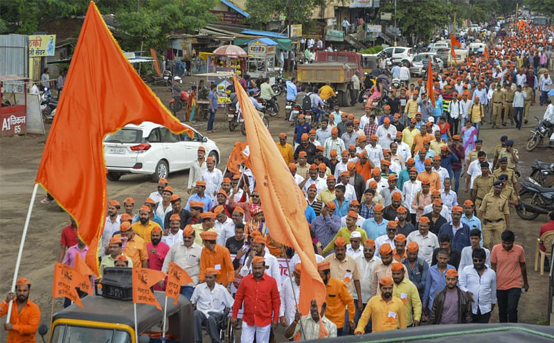 Protestors from the Maratha community take part in a rally demanding reservation, in Karad, Maharashtra. PTI