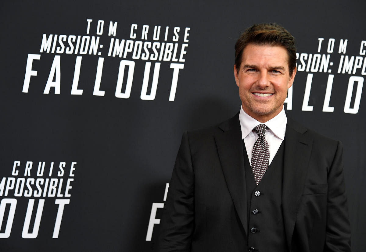Actor Tom Cruise poses for photographers as he arrives on the red carpet for the premiere of Mission:Impossible-Fallout, at the Smithsonian's National Air and Space Museum, in Washington. Reuters photo