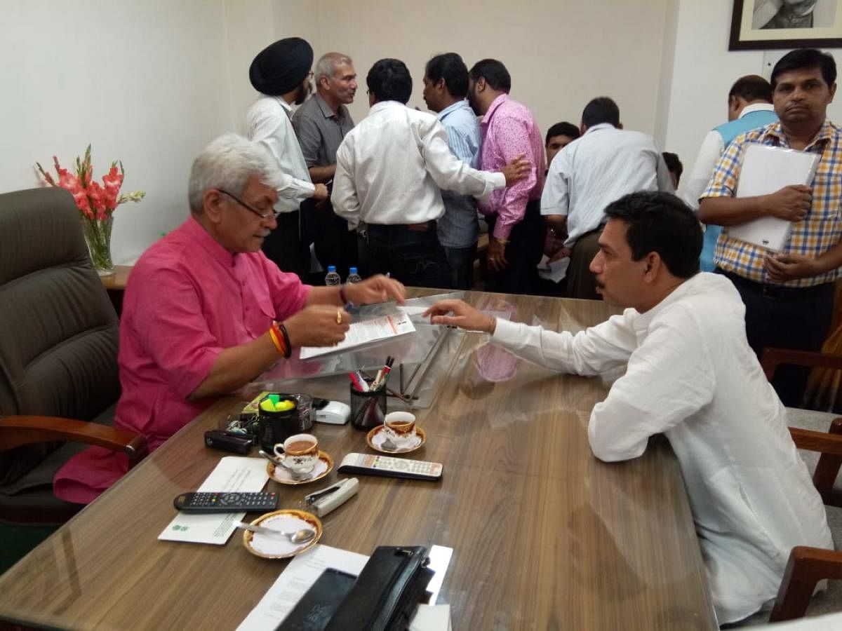 MP Nalin Kumar Kateel meets Minister of State for Railways Manoj Sinha and submits a memorandum to upgrade Mangaluru Central Railway Station into international standards