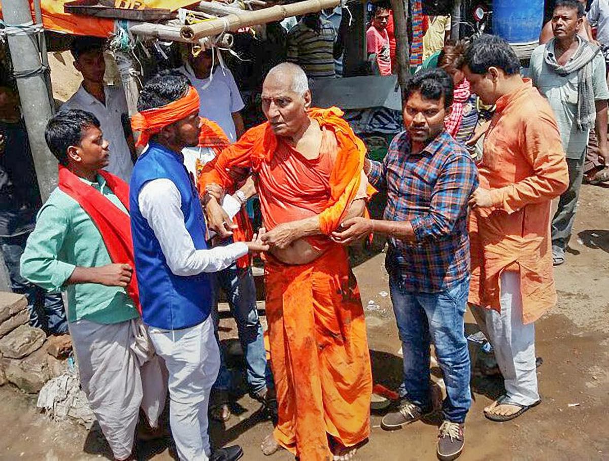 Social activist Swami Agnivesh after he was allegedly assaulted by Bharatiya Janata Yuva Morcha (BJYM) workers, during his visit to Pakur on Tuesday, July 17, 2018. (PTI Photo)