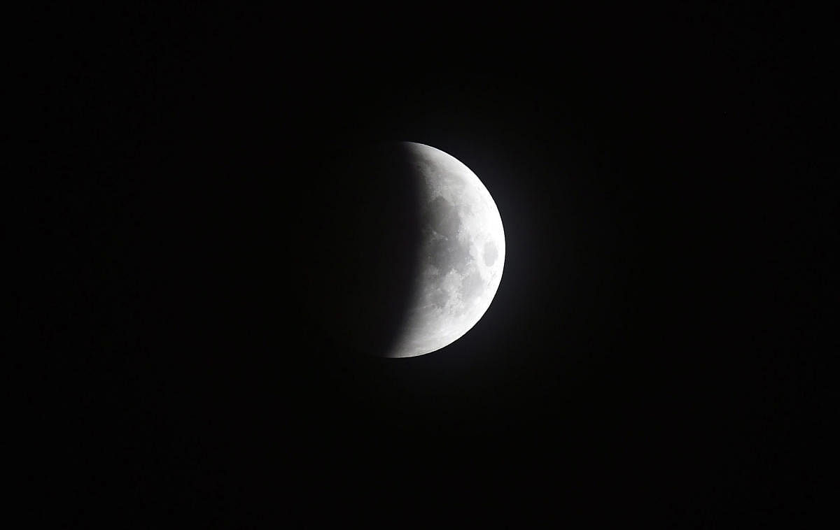 Lunar Eclipse as seen in Chennai, on Saturday, July 28, 2018. longest lunar eclipse of the century turns the moon red. (PTI Photo/R Senthil Kumar)
