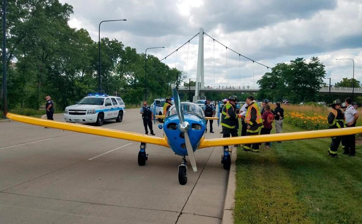 The small plane made an emergency landing on Lake Shore Drive, Chicago. (Credit: Twitter)