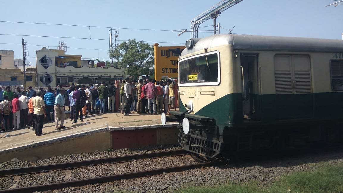 The shocking incident took place at around 8.30 am on Tuesday when the Chennai Beach-Tirumalpur train was approaching the Mount station, one of the busiest in the network, and the passengers travelling on foot-board hit against the parapet wall near electric poles. (DH Photo)