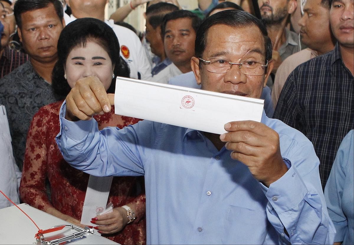 Cambodian Prime Minister Hun Sen holds his ballot at a polling station in Takhmua, Kandal province, southeast of Phnom Penh, Cambodia, Sunday, July 29, 2018. AP/ PTI file photo.