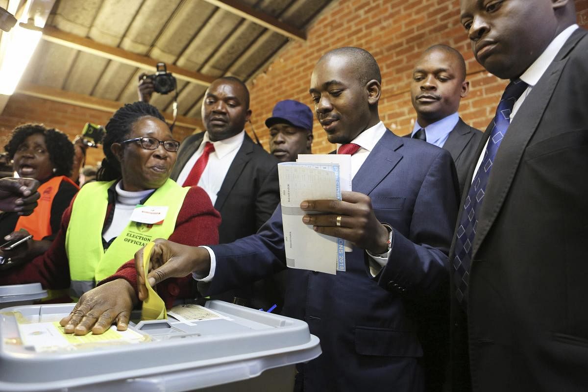 Zimbabwe's main opposition leader Nelson Chamisa casts his vote at a polling station in Harare. (AP/PTI)