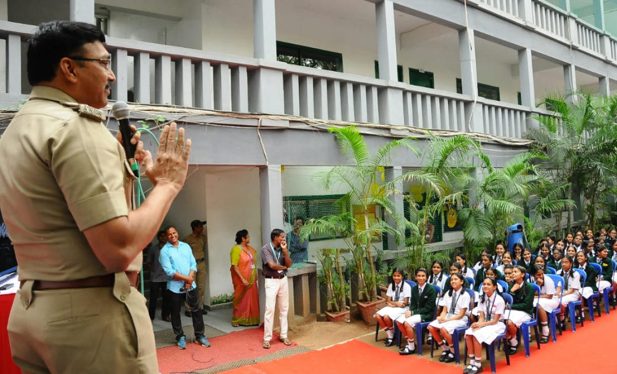 ACP Kasim Raja speaks at a road safety programme at The Indiranagar Cambridge School in New Thippasandra on Monday.