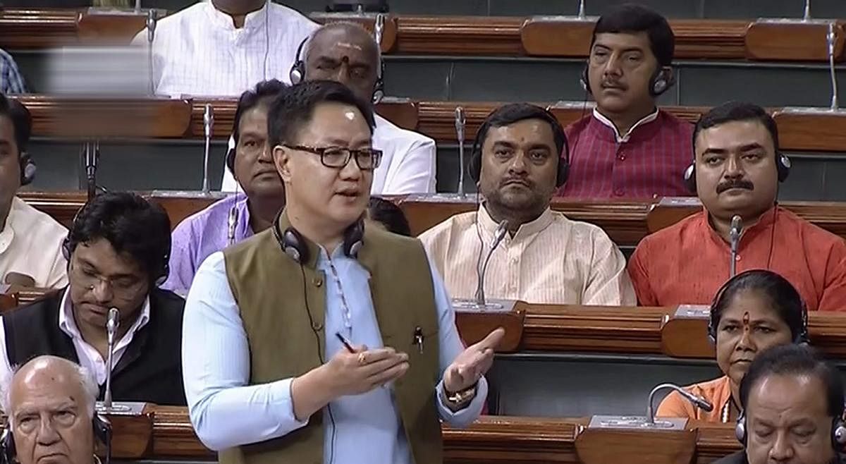 Union Minister of State for Home Affairs Kiren Rijiju speaks in the Lok Sabha during the Monsoon session of Parliament, in New Delhi on Tuesday, July 31, 2018. (LSTV GRAB via PTI)