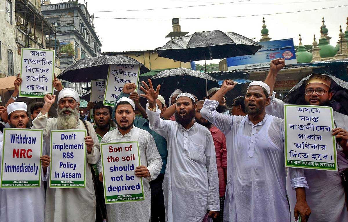 All Bengal Minority Youth Federation activists raise slogans during a protest against Assam's controversial National Register of Citizen (NRC) draft, in front of Tipu Sultan mosque in Kolkata on Tuesday. PTI Photo