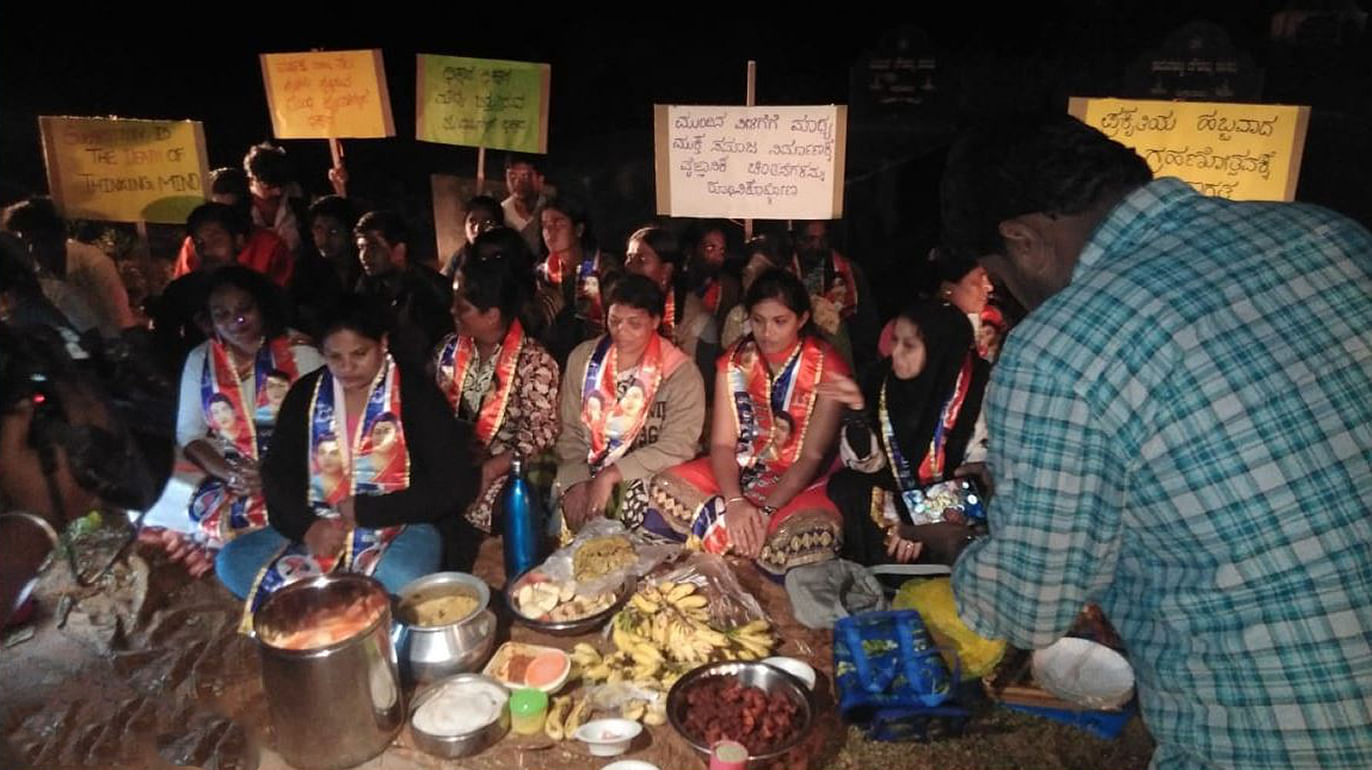 Team Bheemaputri Brigade enjoying a late-night meal at the Chandapura graveyard.