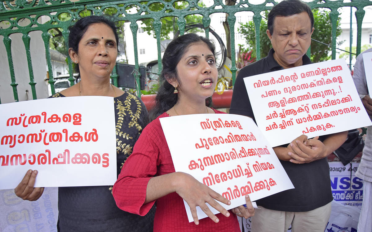 Activist Indulekha Joseph (centre) during a protest seeking an end to the practice of priests hearing confessions of women, near the State Secretariat in Thiruvananthapuram. PTI file photo.