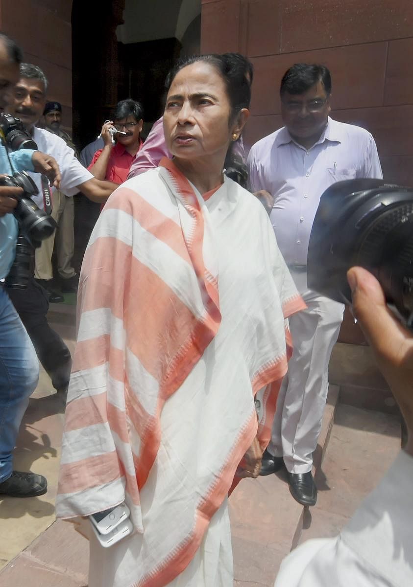 West Bengal Chief Minister Mamata Banerjee arrives at Parliament House, in New Delhi on Wednesday. (PTI Photo)