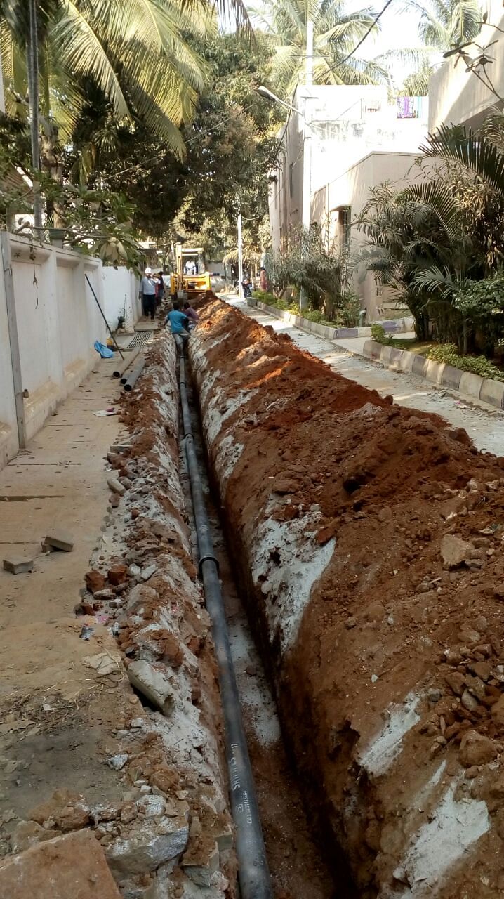 BWSSB personnel lay pipelines to supply Cauvery water in one of the villages on the outskirts of Bengaluru.