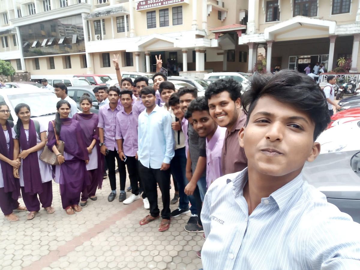 Students pose for a selfie as part of the campaign against drug abuse on campus in Mangaluru.