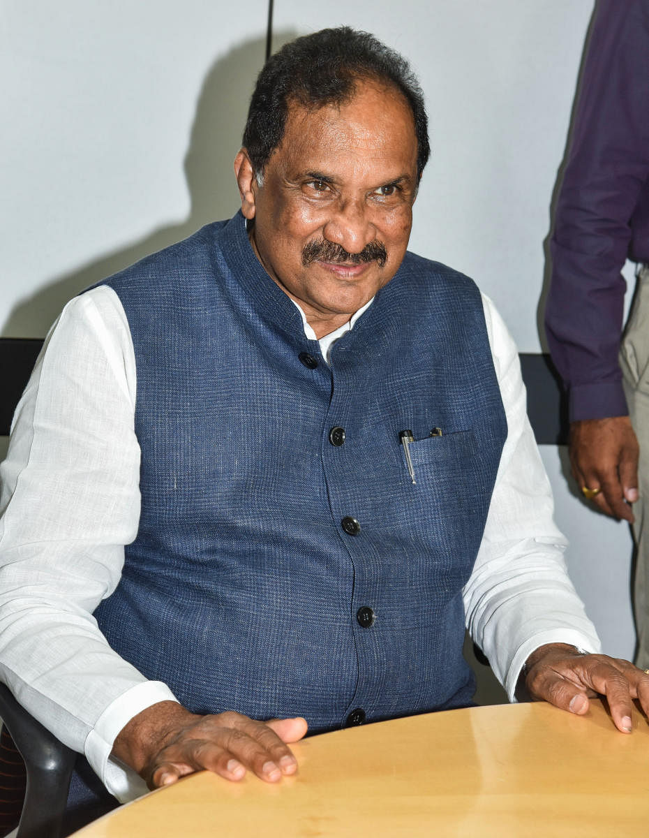 Minister K J George at the Deccan Herald office in Bengaluru on Friday. DH Photo