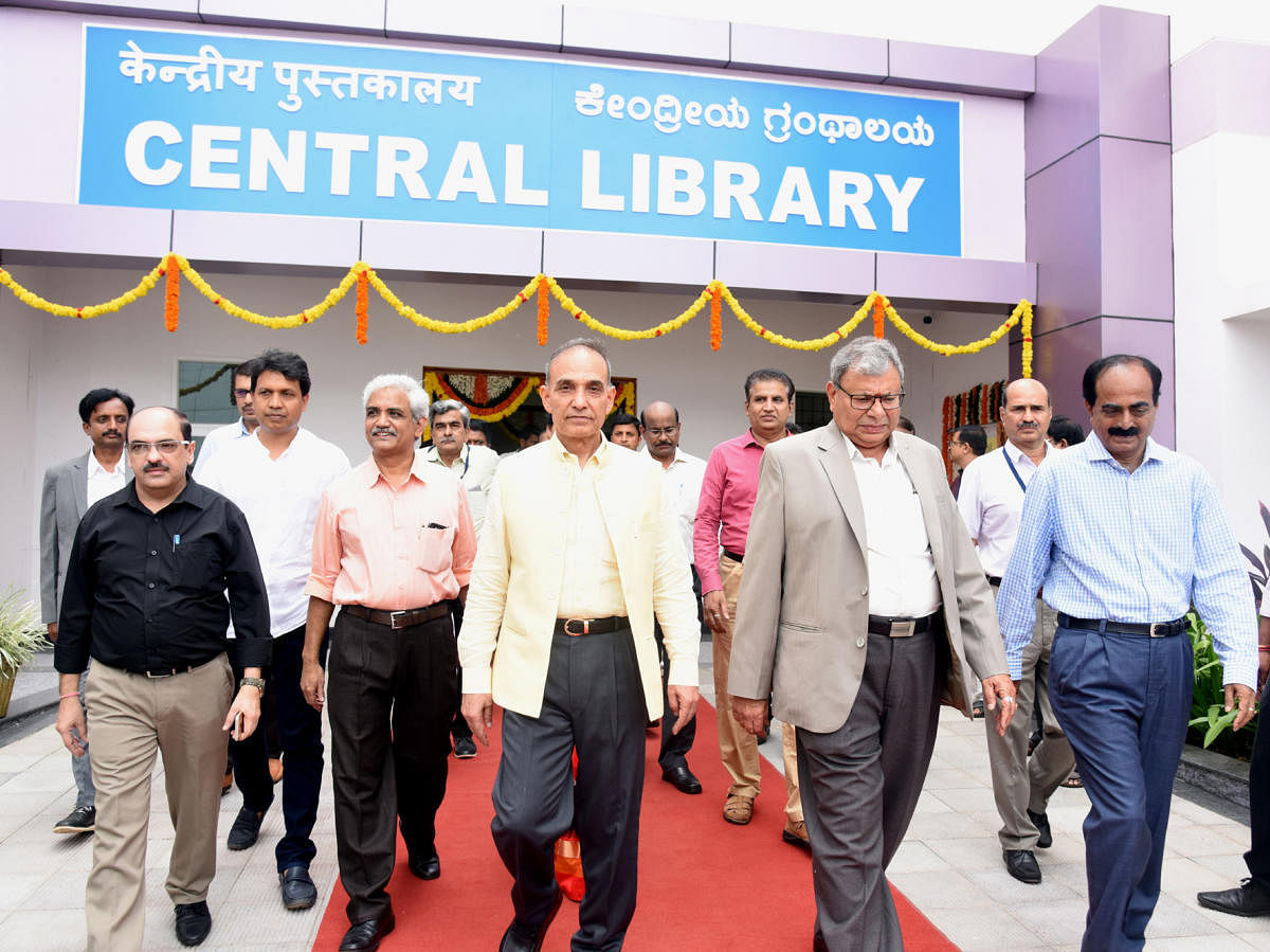 Union Minister of State for HRD and Water Resources Satyapal Singh and other dignitaries come out after inaugurating e-digital library at NITK, Surathkal, on Saturday.