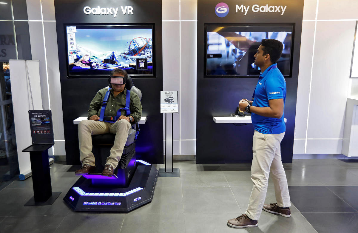 A customer tries a Samsung Gear VR at a Samsung showroom in New Delhi, India. REUTERS