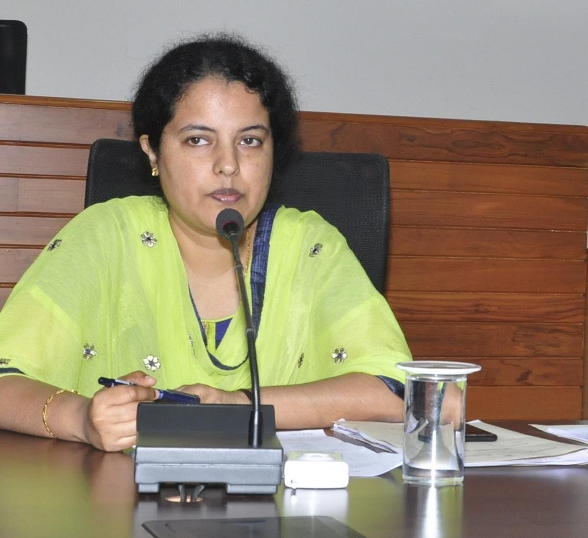 Udupi DC Priyanka Mary speaks at a meeting in Udupi on Saturday.