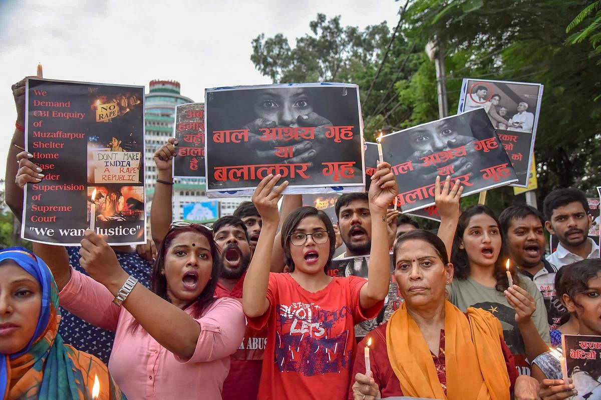 Members of different organisation stage a protest march against the recent incident of Muzaffarpur shelter home rape case, in Patna. (PTI Photo)