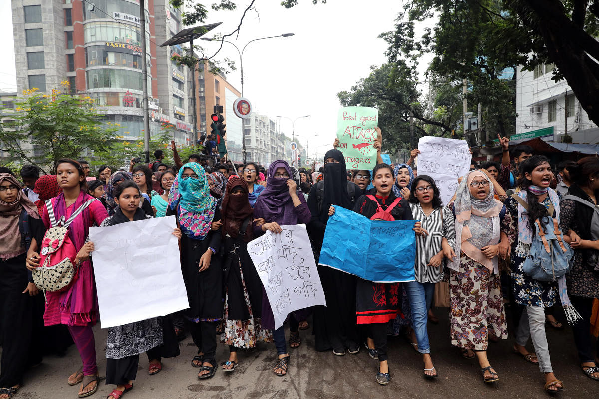 Students shout slogan during a rally as they join in a protest over recent traffic accidents that killed a boy and a girl, in Dhaka, Bangladesh, August 5, 2018. REUTERS