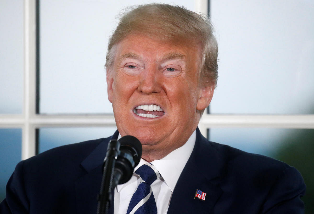 U.S. President Donald Trump speaks at a dinner with business leaders at Trump National Golf Club in Bedminster, New Jersey, U.S., August 7, 2018. (REUTERS/Leah Millis)