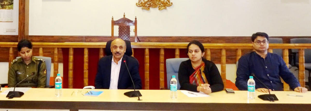 State Chief Information Commissioner Dr Suchetana Swaroop speaks during a meeting at the DC’s office hall in Madikeri on Wednesday. District Superintendent of Police Sumana D Pannekara, Deputy Commissioner P I Srividya and Zilla Panchayat CEO Prashant Kumar Mishra look on.