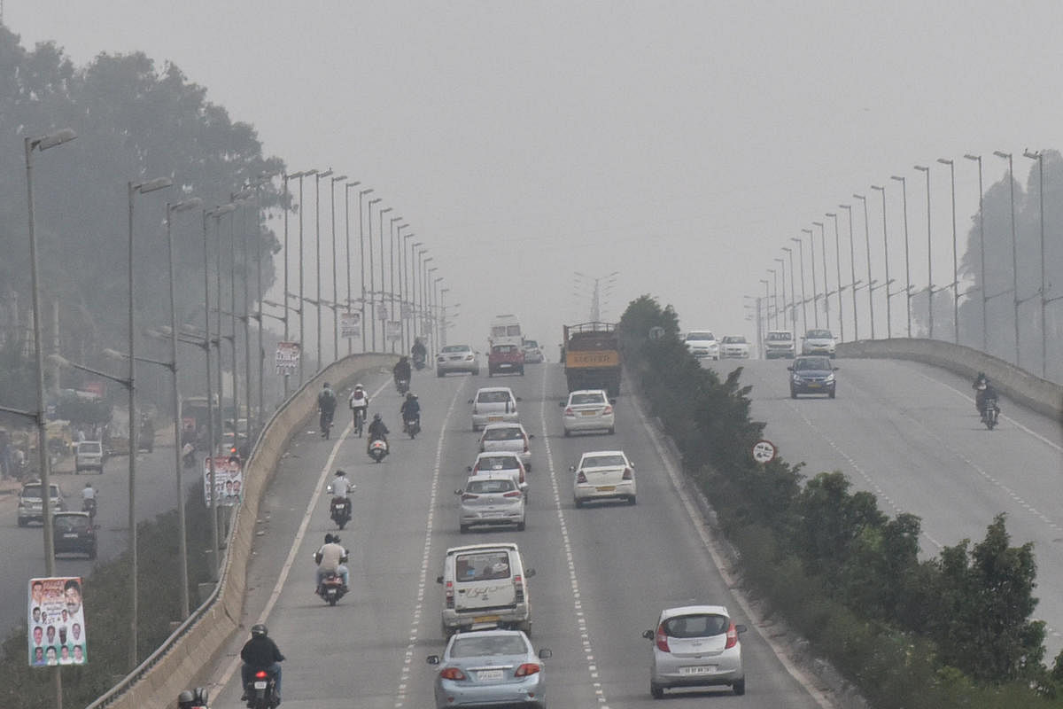 Mist is seen at airport elevated express way in Bengaluru on Sunday. Photo by S K Dinesh