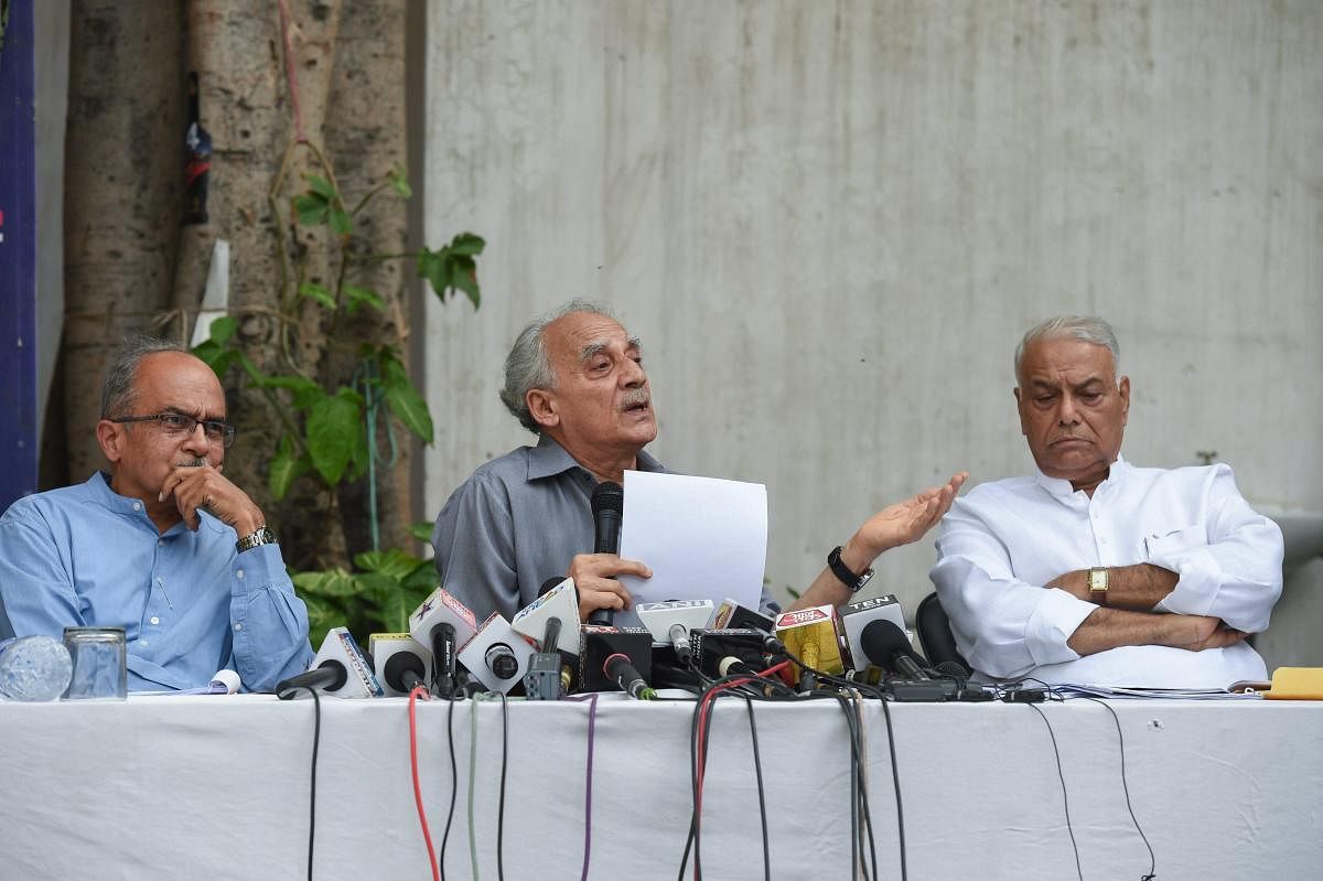 Lawyer Prashant Bhushan with former union ministers Arun Shourie and Yashwant Sinha during a press conference, in New Delhi on Aug 8, 2018. (PTI Photo/Atul Yadav)