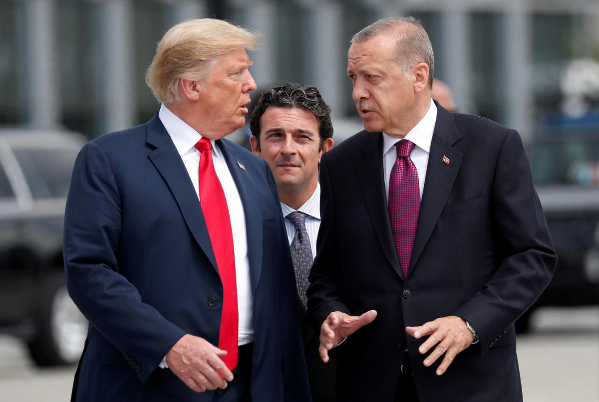 US President Donald Trump and Turkish President Tayyip Erdogan at the start of the Nato summit in Brussels, Belgium on July 11, 2018. Reuters