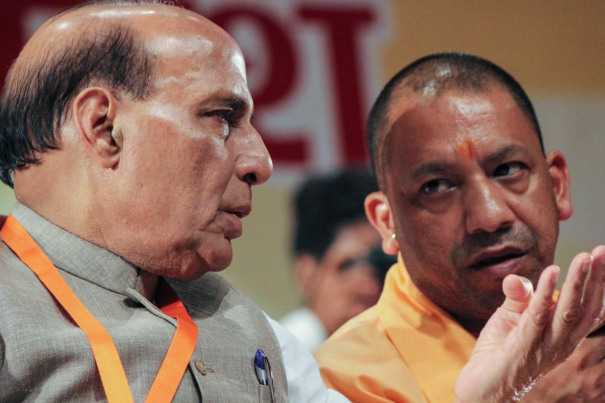 Union Home Minister Rajnath Singh and Uttar Pradesh Chief Minister Yogi Adityanath during the State BJP Working Committee meeting in Meerut on Saturday. PTI