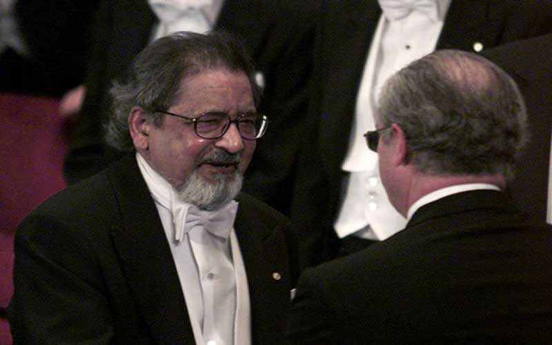 File photo of V.S. Naipaul receiving his Nobel prize for literature at Stockholm's Konserthuset from Sweden's King Carl Gustaf. (Reuters)